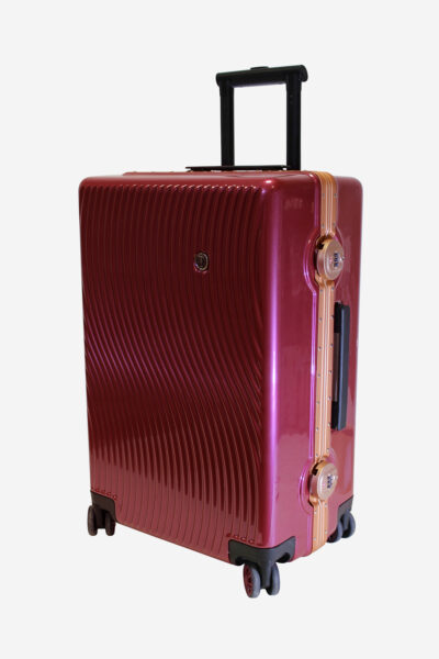 Image of a red suitcase made from Polycarbonate and ABS material, representing durability and style at Luxury-Leather.net.