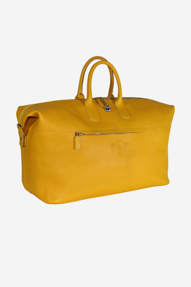 Image of a yellow leather duffle bag with Murano glass murrina detailing at the zipper, symbolizing Italian craftsmanship and luxury at Luxury-Leather.net.